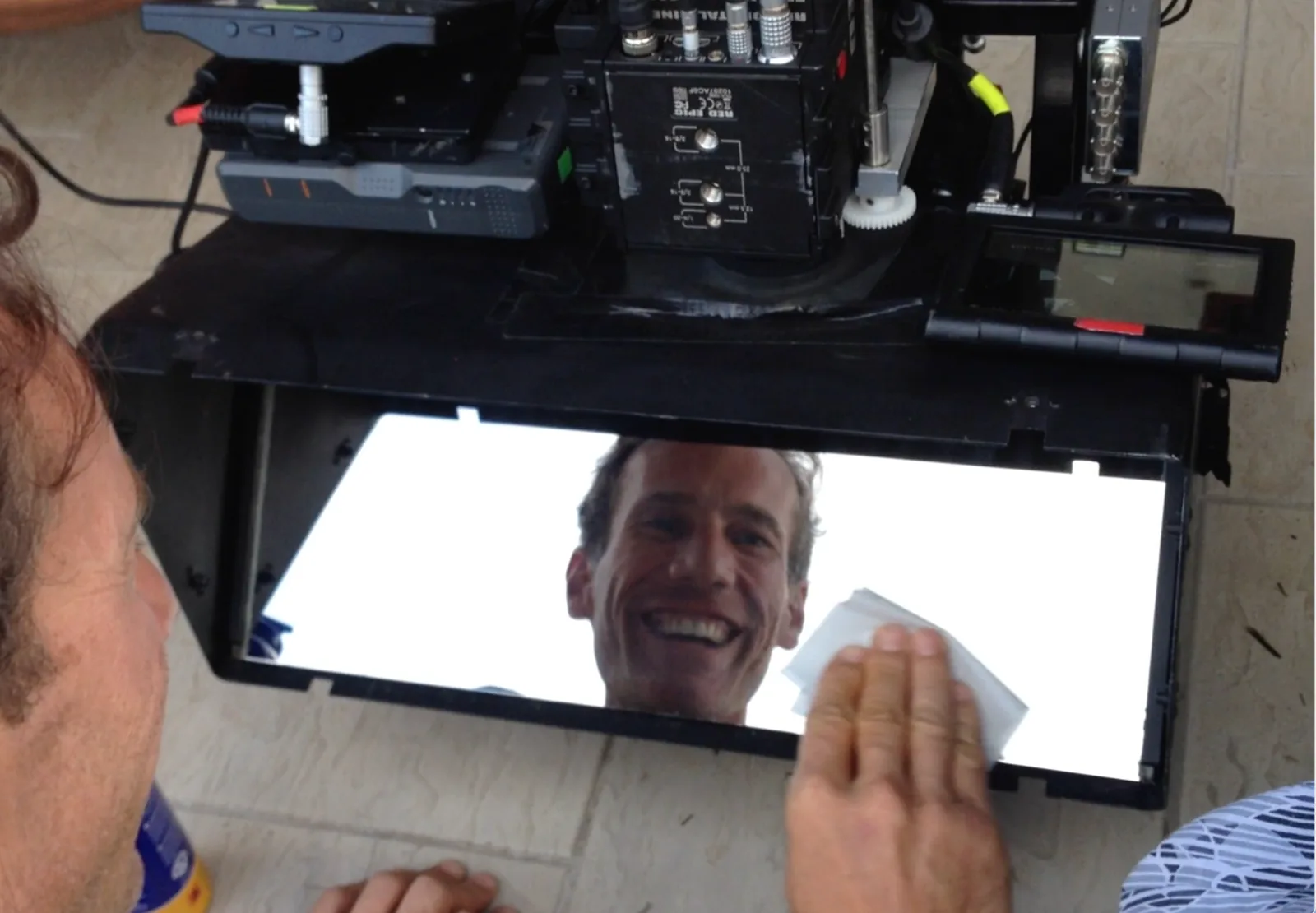 Kenneth Corben cleaning 3D beam splitter mirror in Fiji
